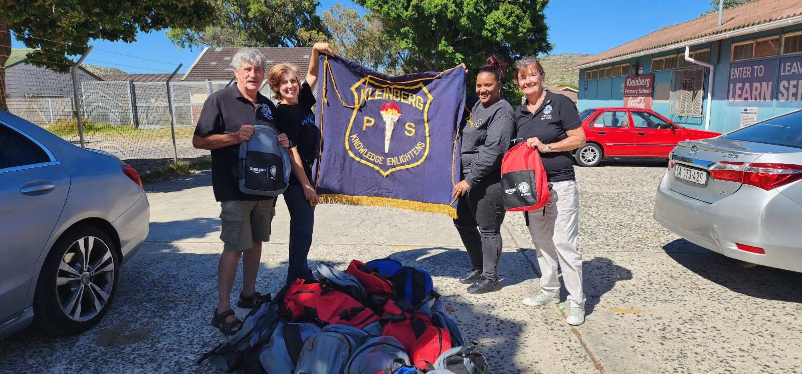 Delivering 124 Amazon/Lions Stationary Bags to Ocean View & Simonstown Schools